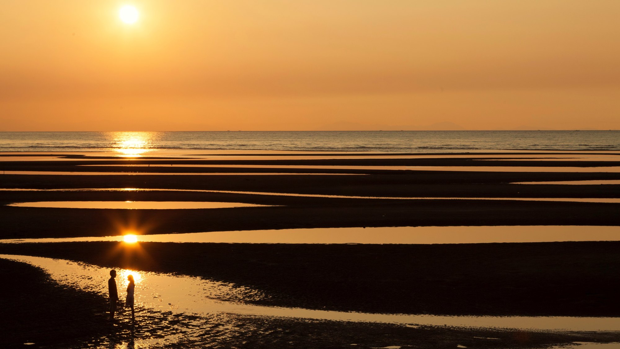 Sunset over the tidal flats of Matama Beach, Bungo-Takada